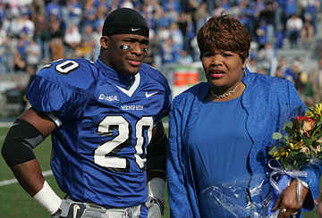 DeAngelo Williams and his mom, Sandra Kay Hill, before a Memphis game in November 2005. ( Nelson Chenault/US PRESSWIRE)